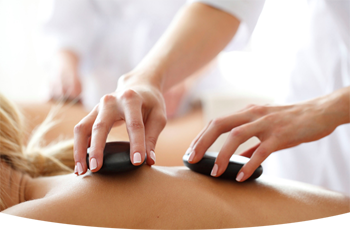 Hot Stone Masage to reduce stress, anxiety, muscle tension & pain